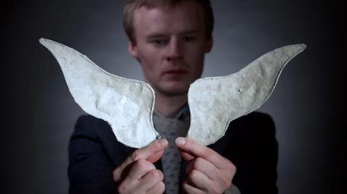 A Very Old Man with Enormous Wings